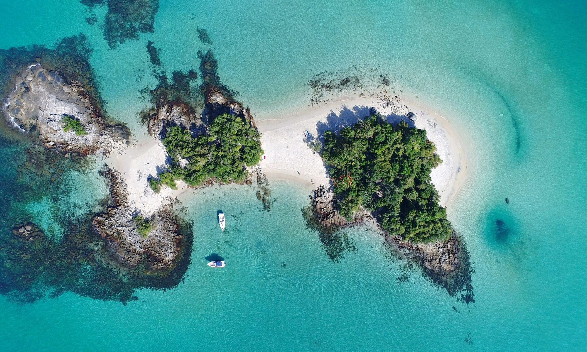 Turquoise lagoon near Jericoacoara with hammocks in the water